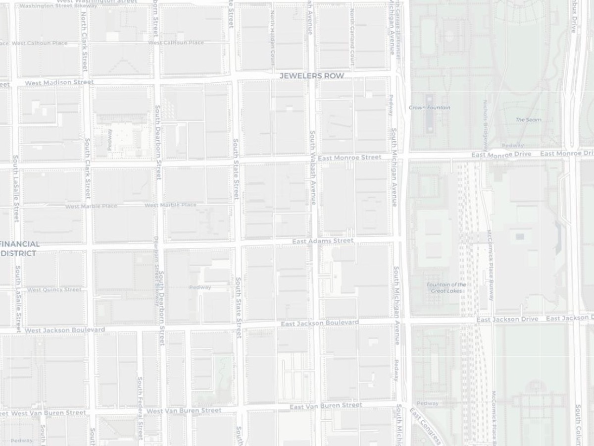 A map of downtown Chicago, with streets revealed as fog clears